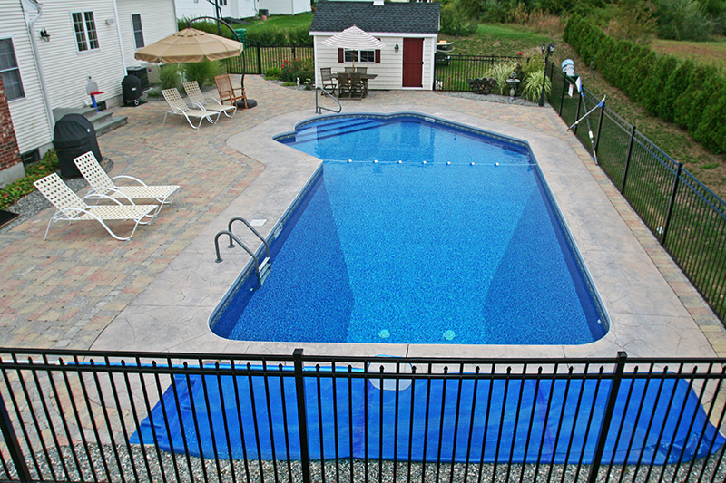 Swimming pool and stamped concrete project example 190
